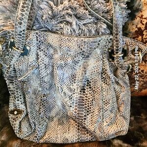 Elliot Luca large snakeskin handbag.